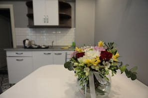 Enjoy cooking in this well-equipped kitchen with oven and coffee maker.