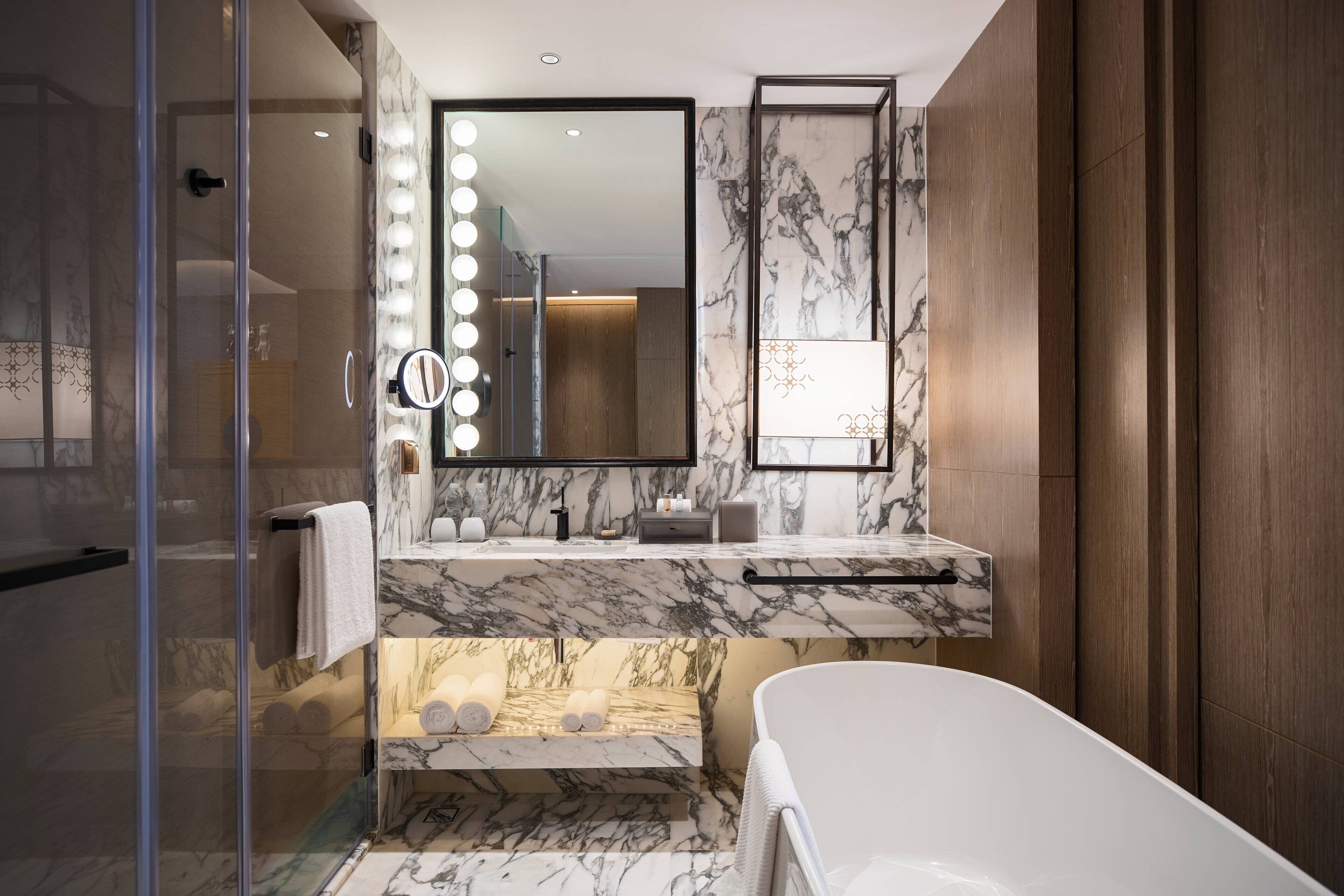 separate bathtub and shower, deep-soaking bathtub, rainfall showerhead