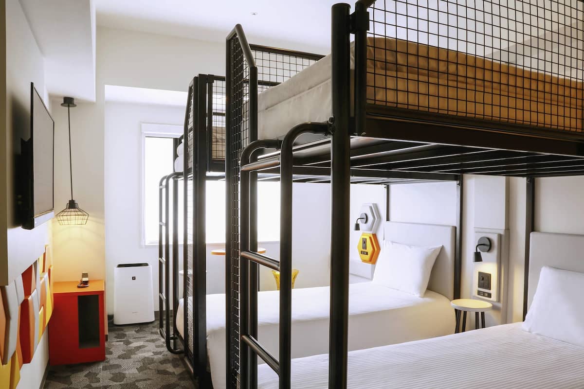 Superior Quadruple Room, Multiple Beds | Down comforters, in-room safe, blackout drapes, iron/ironing board
