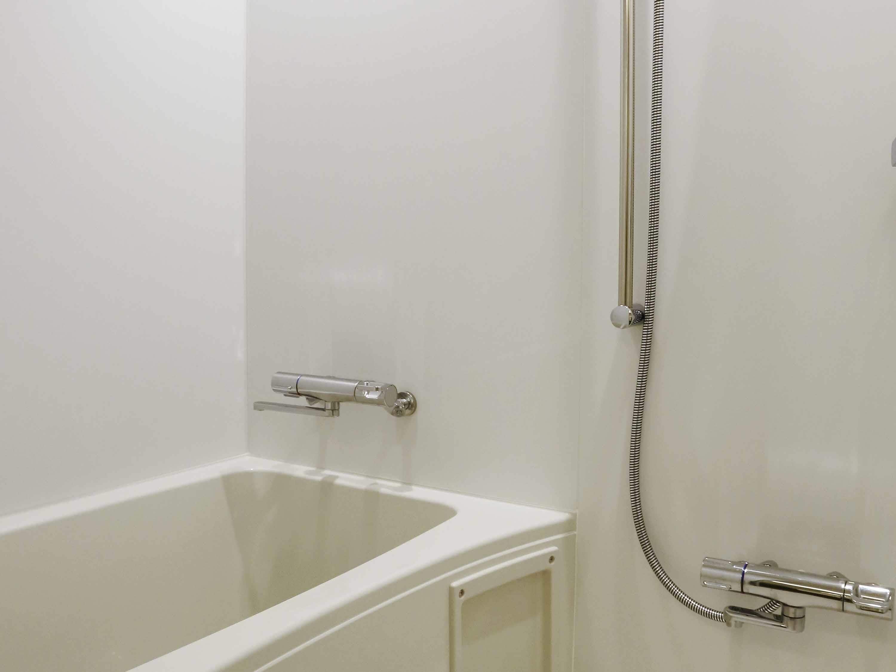 Superior-værelse - flere senge | Dundyner, pengeskab på værelset, mørklægningsgardiner