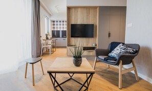 Studiosvit - 1 sovrum (Brownie) | Vardagsrum | 49-tums platt-tv med kabelkanaler, tv och Netflix