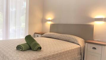 2 dormitorios, tabla de planchar con plancha, wifi gratis y ropa de cama