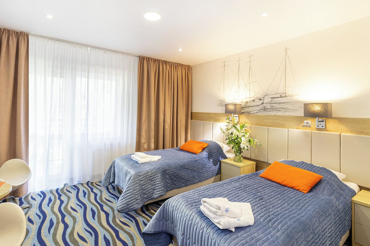 Double or Twin Room | In-room safe, desk, iron/ironing board (on request), cribs (surcharge)