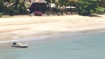 On the beach, sun loungers