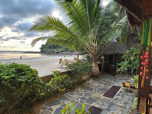 Waterfront villa with live-in staff!