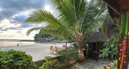 Waterfront villa with live-in staff!