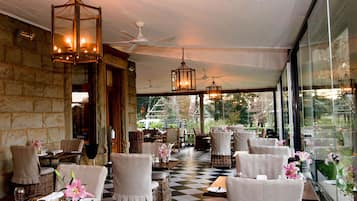 2 restaurants, breakfast, lunch, dinner served; local cuisine