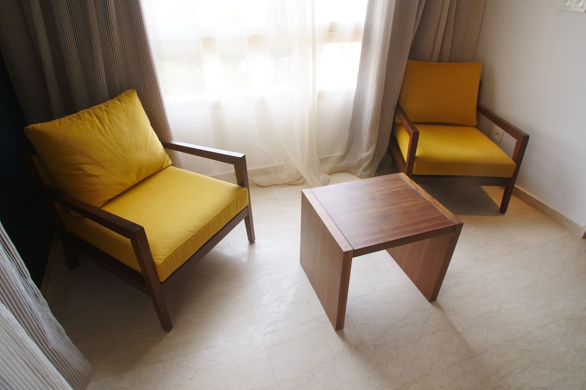 Apartment, Pool View | Living area | 50-inch Smart TV with satellite channels, TV