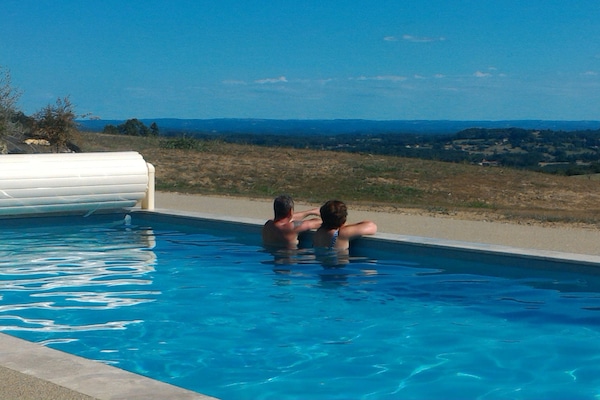 Seasonal outdoor pool, open 9:00 AM to 7:00 PM, pool umbrellas