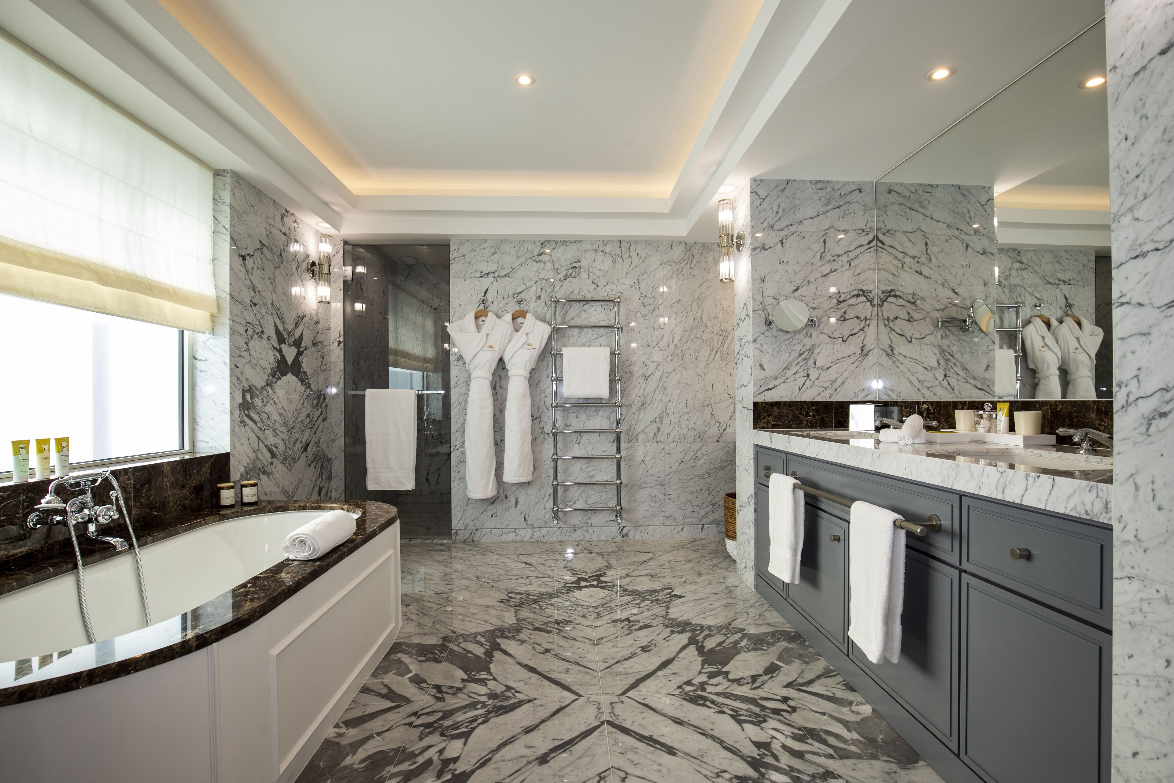 presidential room | bathroom | shower, free toiletries, hair dryer, slippers