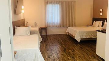 Familiestudio-suite | Minibar, mørklægningsgardiner, gratis Wi-Fi, sengetøj