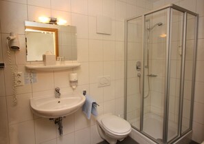 Shower, free toiletries, hair dryer, towels