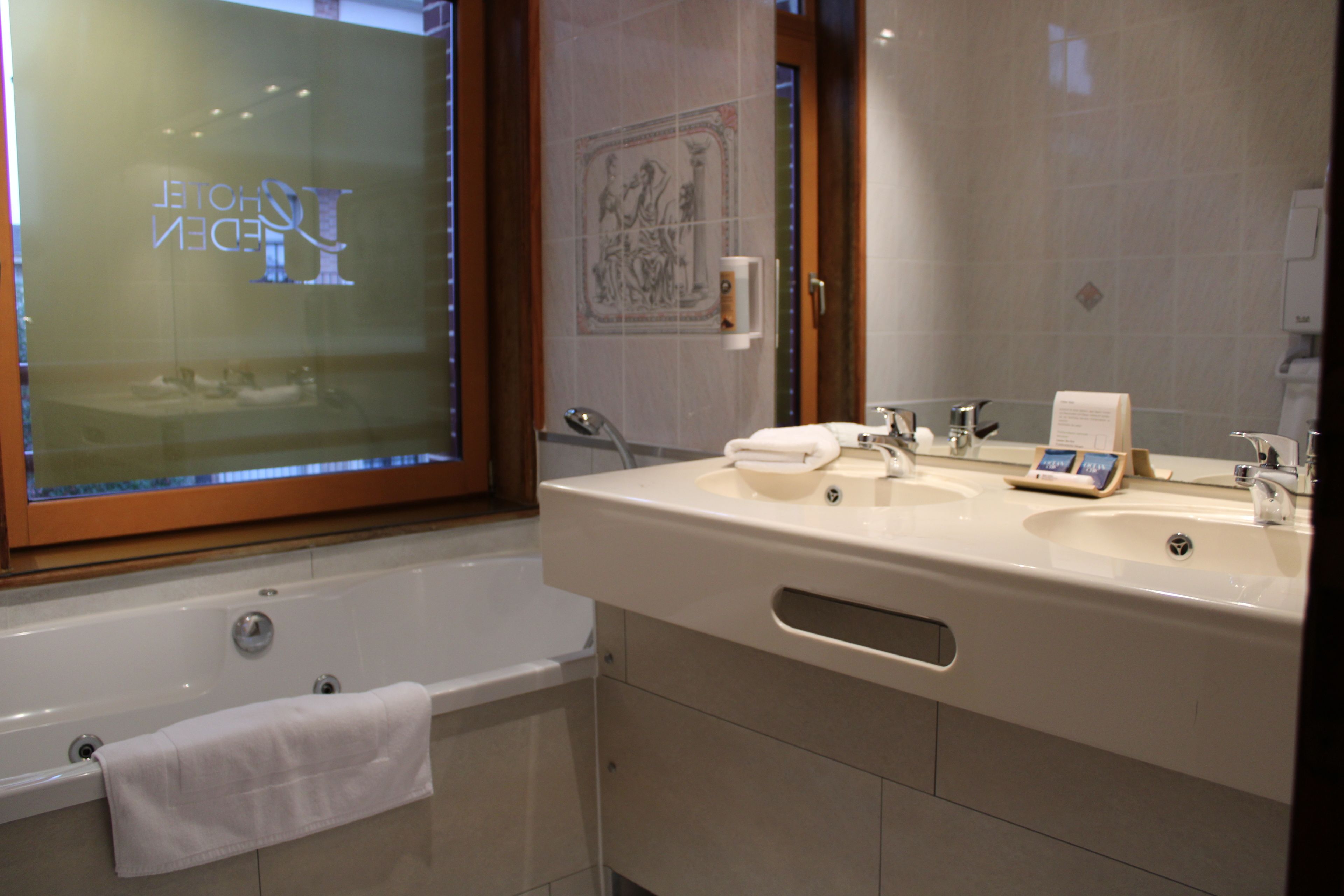superior double room | bathroom | free toiletries, hair dryer, towels