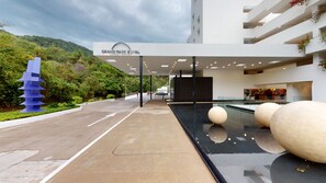 A modern building with a sign reading 'Grand Park Royal Luxury Resort.' - Grand Park Royal Puerto Vallarta - All Inclusive (Puerto Vallarta)
