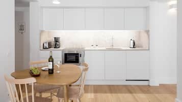 One Bedroom Apartment | Private kitchen | Mini-fridge, microwave, oven, stovetop