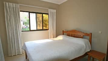 Apartment, 3 Bedrooms | 3 bedrooms, in-room safe, desk, iron/ironing board