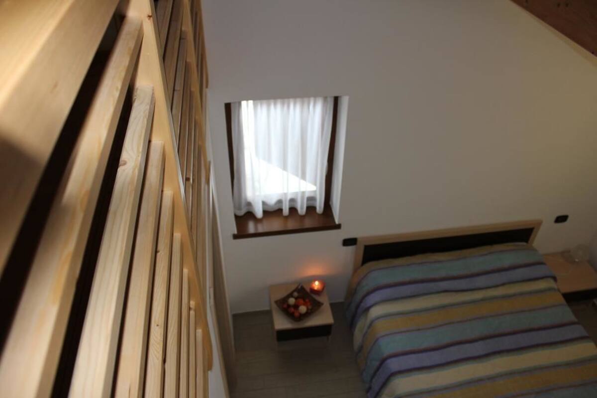 Habitación cuádruple Premium | Insonorización, camas extra, wifi gratis y ropa de cama