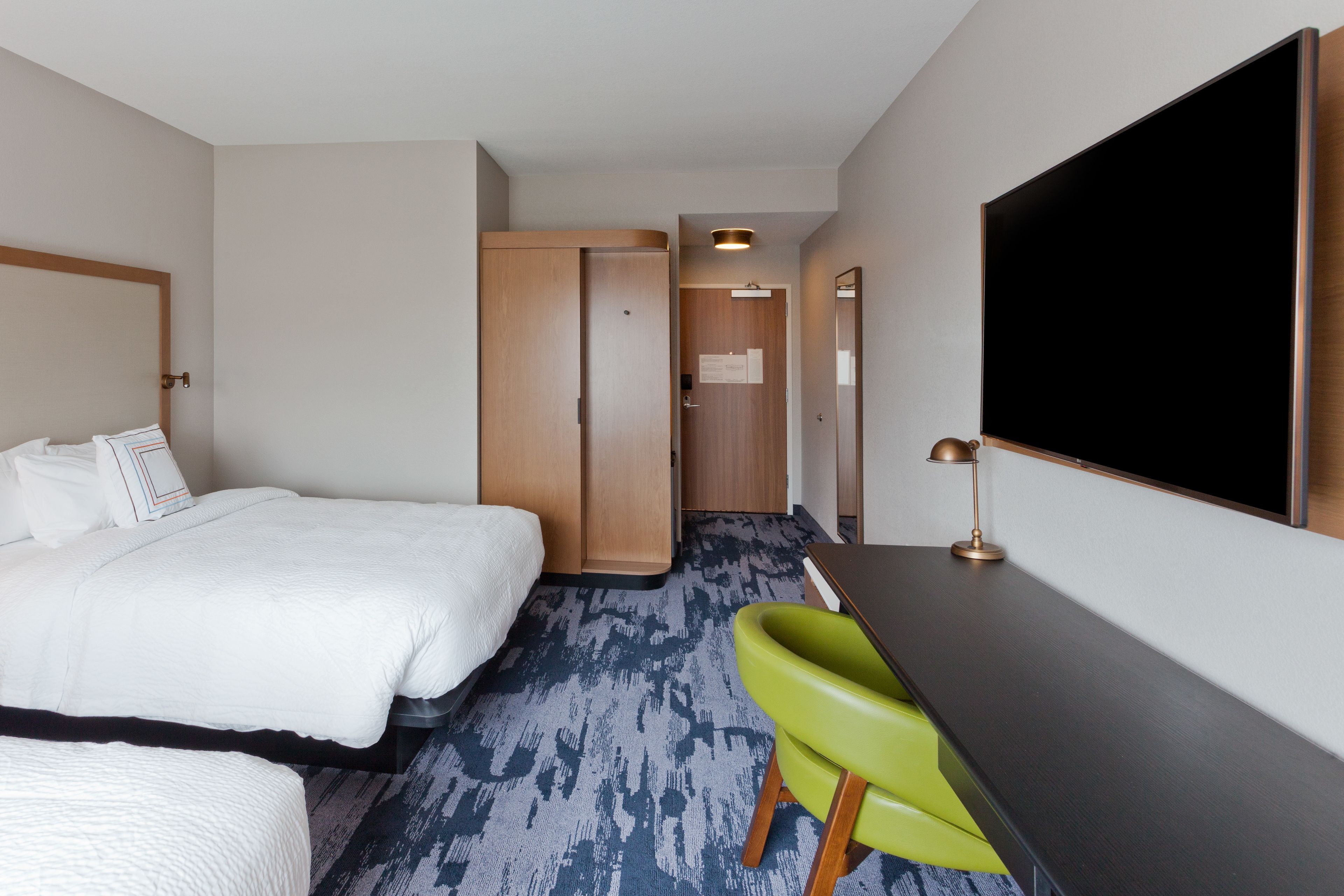 room, 2 queen beds | in-room safe, desk, iron/ironing board, free cots/infant beds