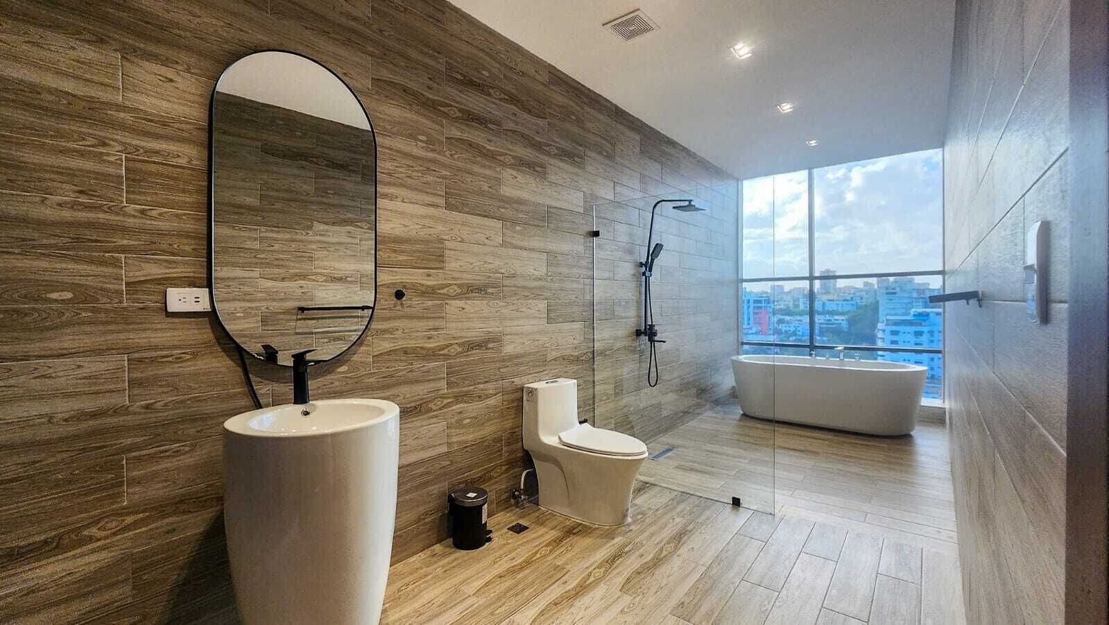 junior studio suite, city view | bathroom | shower, free toiletries, towels