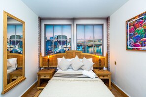Luxe beddengoed, een kluis op de kamer, een bureau