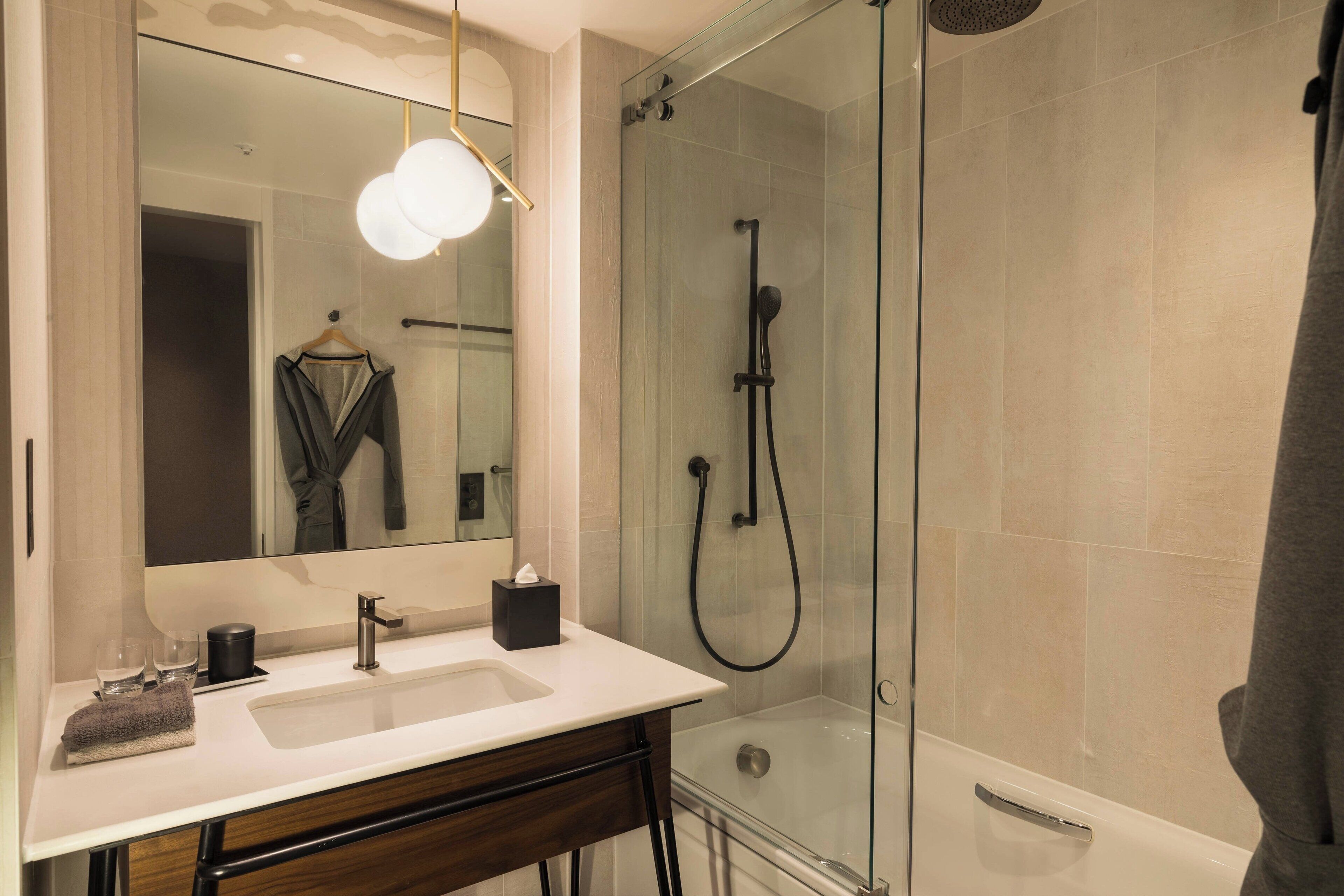 family collection, 2 queen beds | bathroom | eco-friendly toiletries, hair dryer, bathrobes, slippers