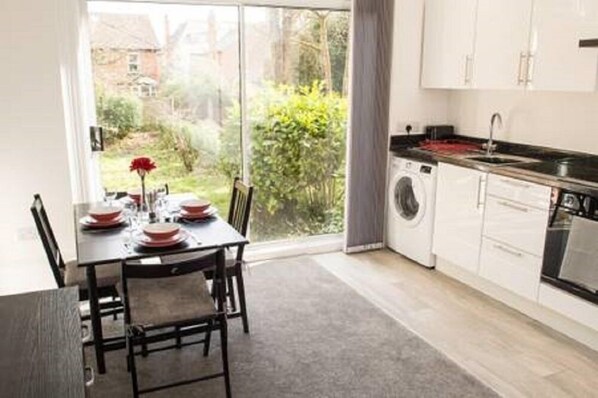 Apartment, 1 Bedroom | Private kitchen | Fridge, microwave, oven, stovetop