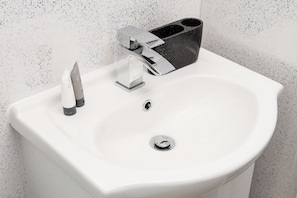 Apartment, 1 Bedroom | Bathroom | Shower, free toiletries, hair dryer, towels