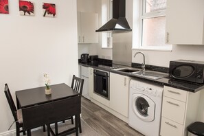 Apartment | Private kitchen | Fridge, microwave, oven, stovetop