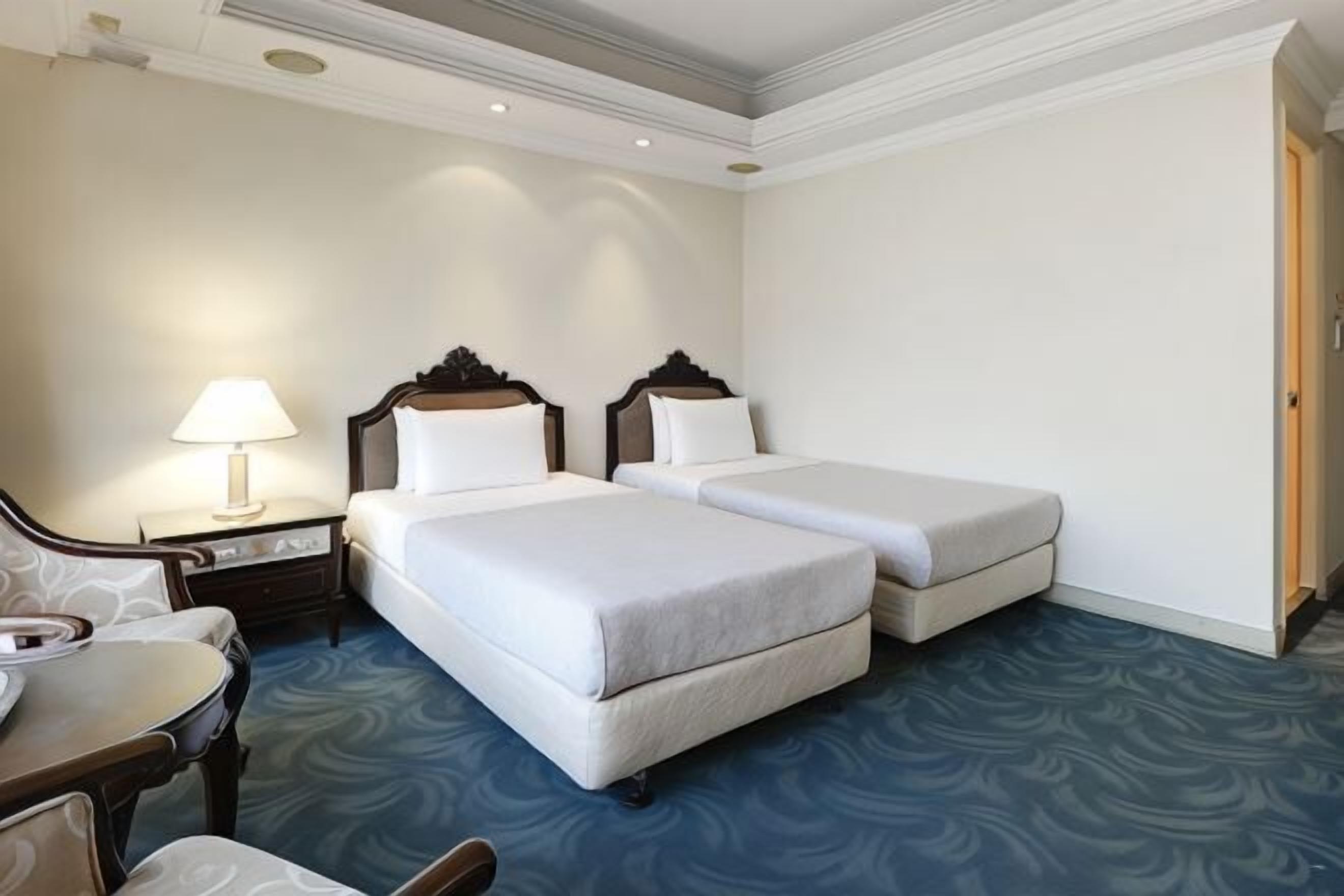 Premium bedding, desk, blackout drapes, soundproofing