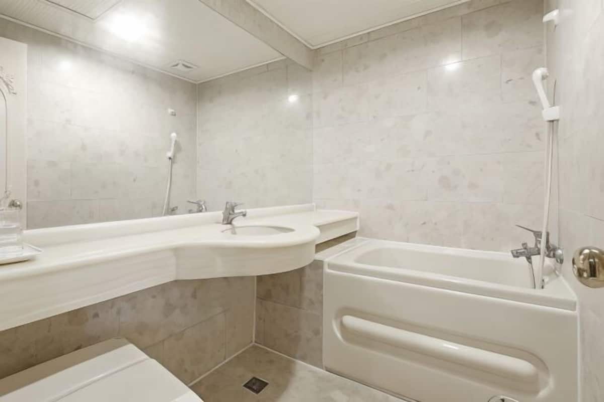 Bathroom | Free toiletries, hair dryer, slippers, towels