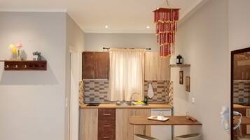 Appartement Confort, en front de plage | Cuisine privée | Réfrigérateur, micro-ondes, plaque de cuisson, machine à expresso