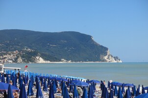 Private beach, sun loungers, beach umbrellas, beach volleyball