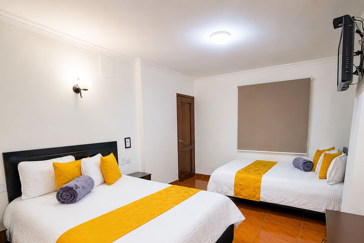 Family Twin Room | Minibar, in-room safe, iron/ironing board (on request), WiFi (free)