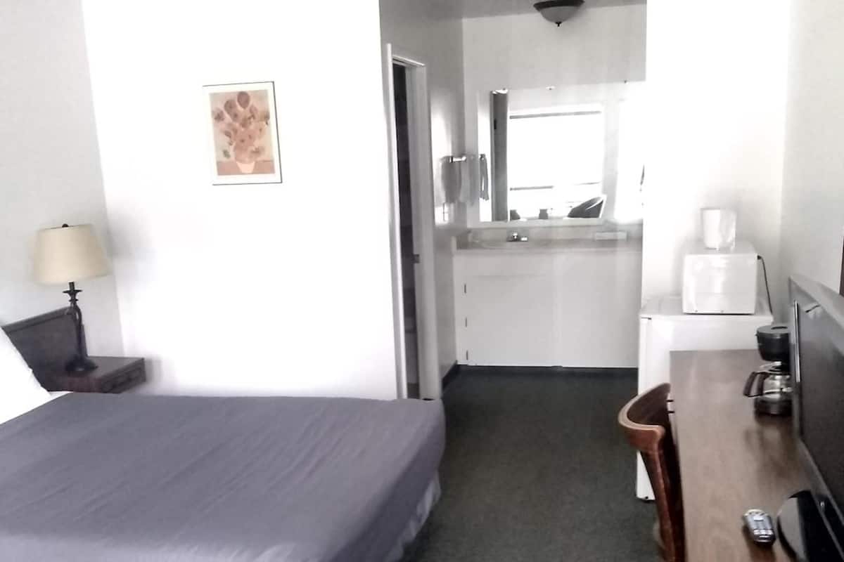 Kamer | Verduisterende gordijnen, een strijkplank/strijkijzer, extra bedden