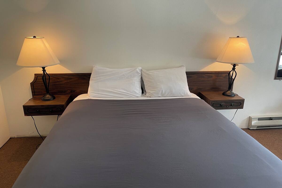 Blackout drapes, iron/ironing board (on request)