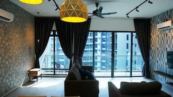 Triple Room Family Apartment | Living area | LCD TV