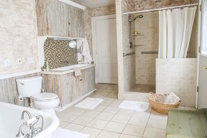 Combined shower/tub, hair dryer, towels, soap