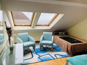 4 habitaciones, tabla de planchar con plancha y cuna de viaje 