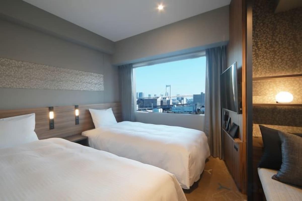 Premium bedding, down comforters, pillowtop beds, in-room safe