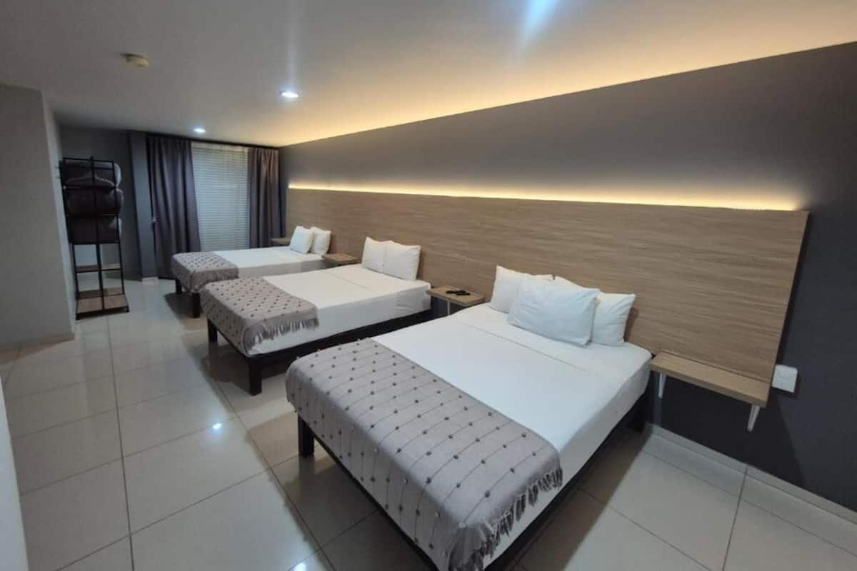 Family Room | Blackout drapes, iron/ironing board, free WiFi, bed sheets