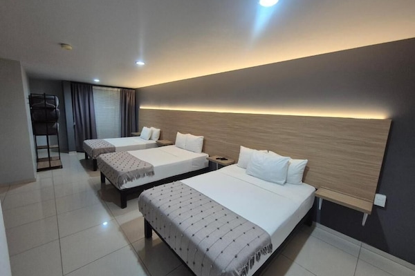 Family Room | Blackout drapes, iron/ironing board, free WiFi, bed sheets