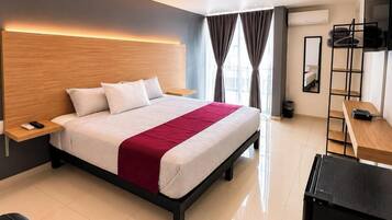 Suite | Cortinas opacas, tabla de planchar con plancha, wifi gratis