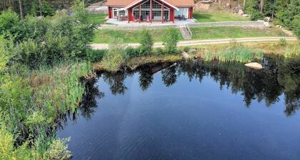 Casa de ensueño en el lago con sauna, chimenea, Wi-Fi, galería / loft, bote, canoa, garaje doble