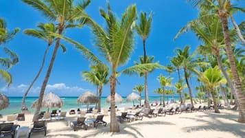 On the beach, sun loungers