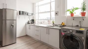 Fridge, microwave, stovetop, coffee/tea maker