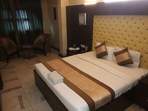 Deluxe kamer | Luxe beddengoed, Select Comfort-bedden, een minibar