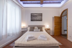 Apartamento conforto, 1 quarto, para não fumantes | 1 quarto, roupas de cama premium, individualmente decorados