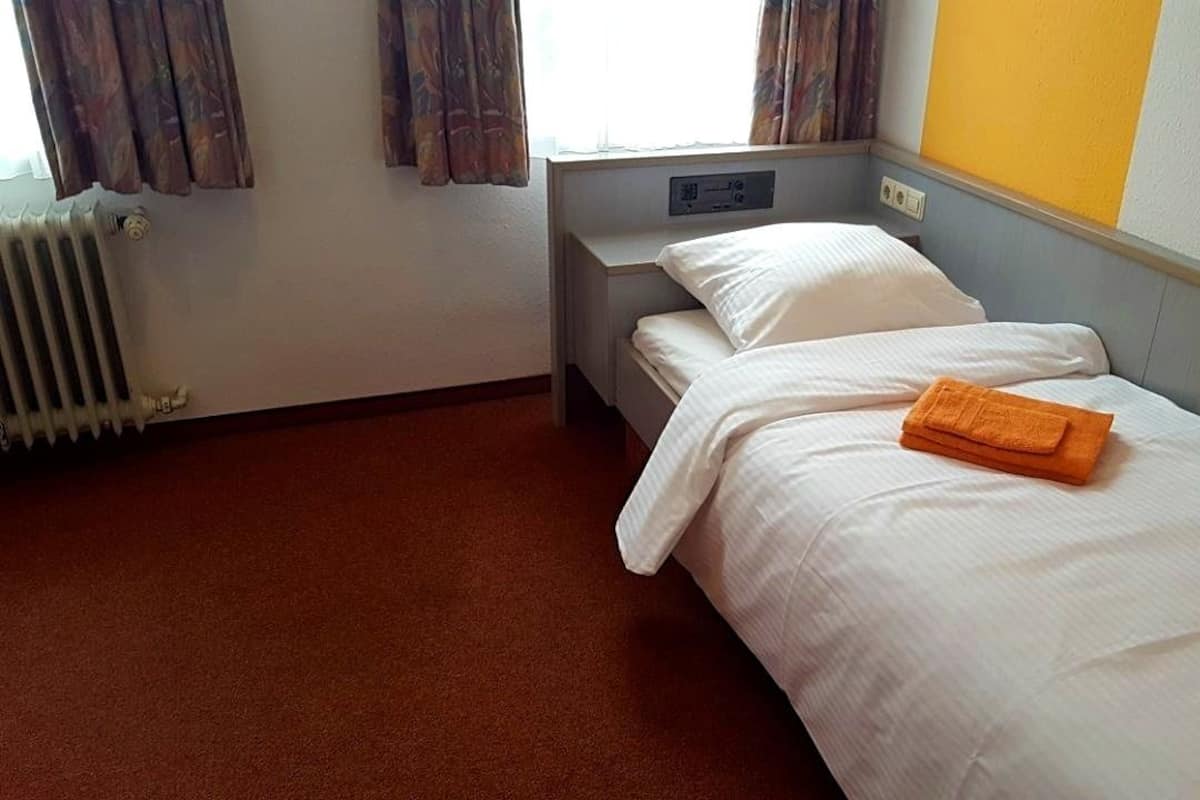 Desk, free WiFi, bed sheets