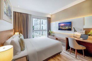 Deluxe Queen Room City View | Premium bedding, in-room safe, desk, laptop workspace - T-Ritz Saigon Hotel & Apartment (Ho Chi Minh City)