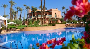 Outdoor pool, pool umbrellas, pool loungers